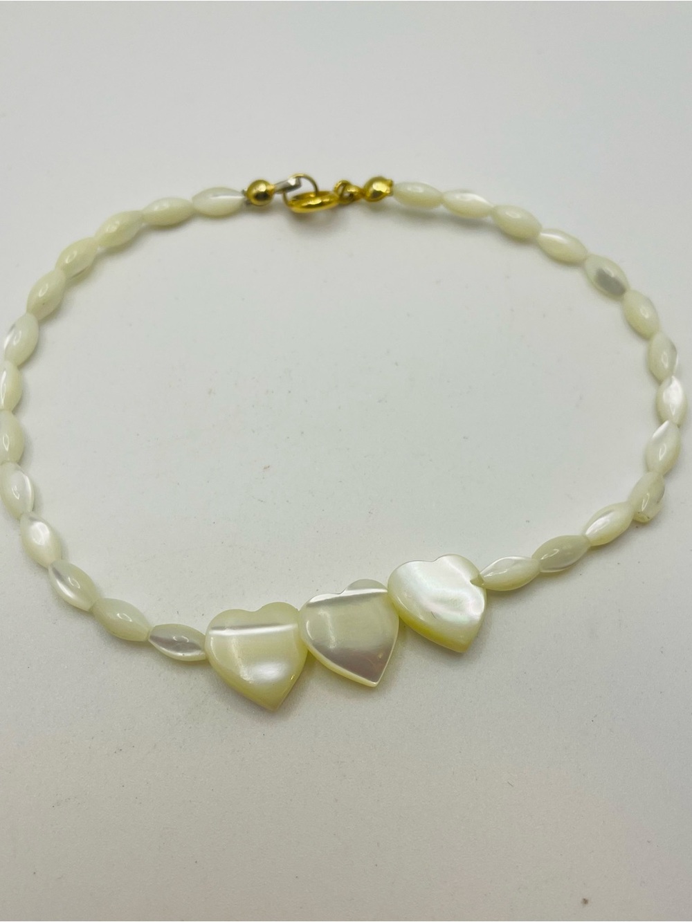 Elegant Mother-of-Pearl Heart Beaded Bracelet - Cream. 9 inches.
